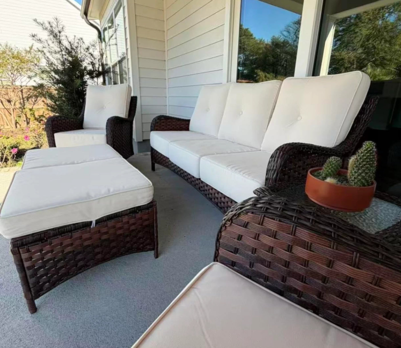 LayinSun 8 - Piece Swivel Glider Conversation Set with 6-Inch Thick Cushions and Fire Pit Table