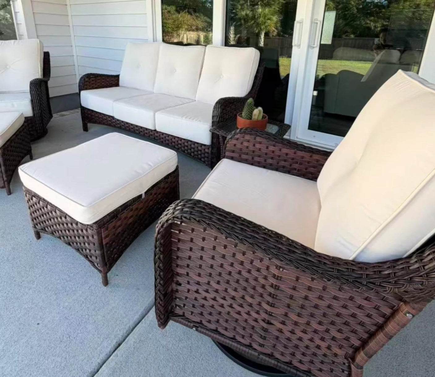 LayinSun 8 - Piece Swivel Glider Conversation Set with 6-Inch Thick Cushions and Fire Pit Table